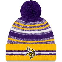 New Era Men's Purple/Gold Minnesota Vikings 2021 NFL Sideline Sport Official Pom Cuffed Knit Hat
